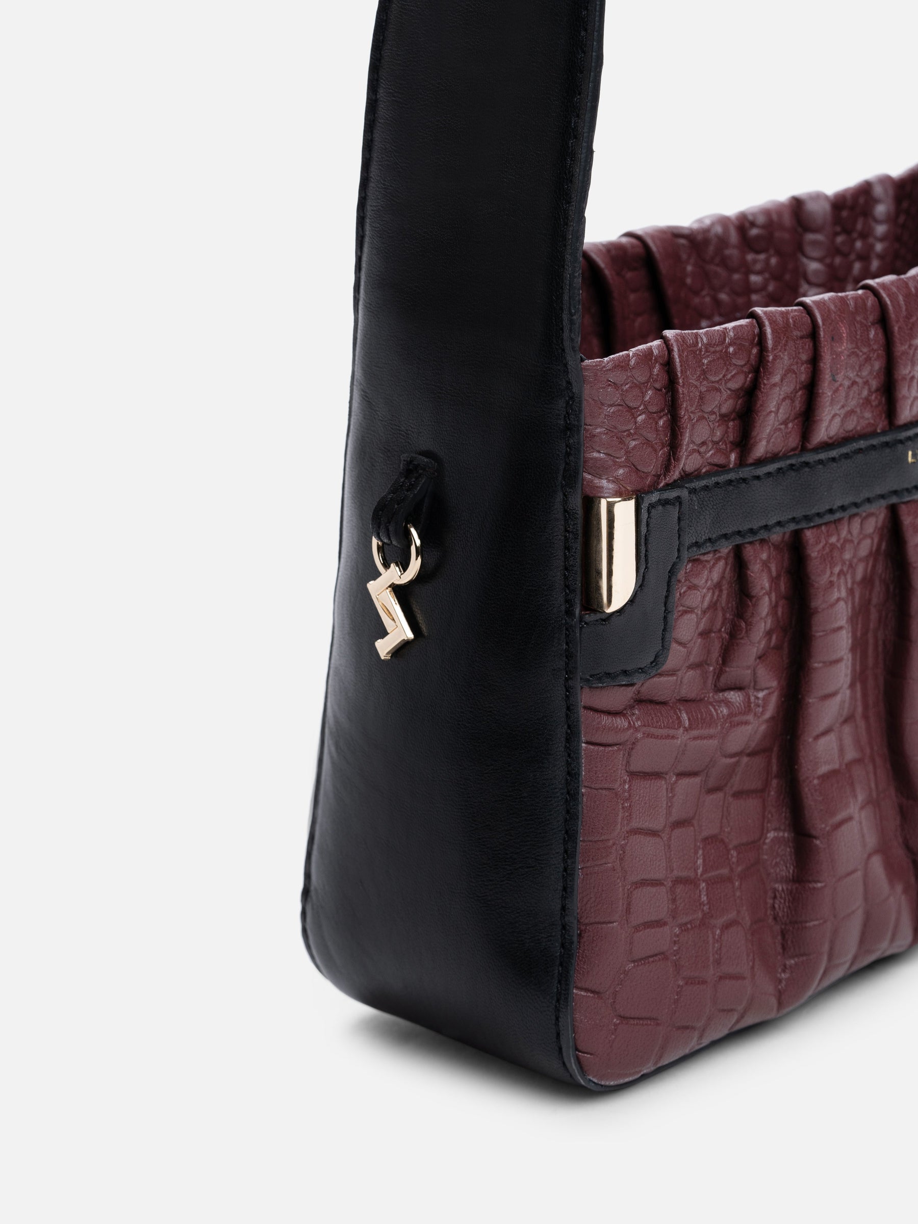 Bagatelle Bag - Luxury Monogram Empreinte Leather Black | LOUIS VUITTON